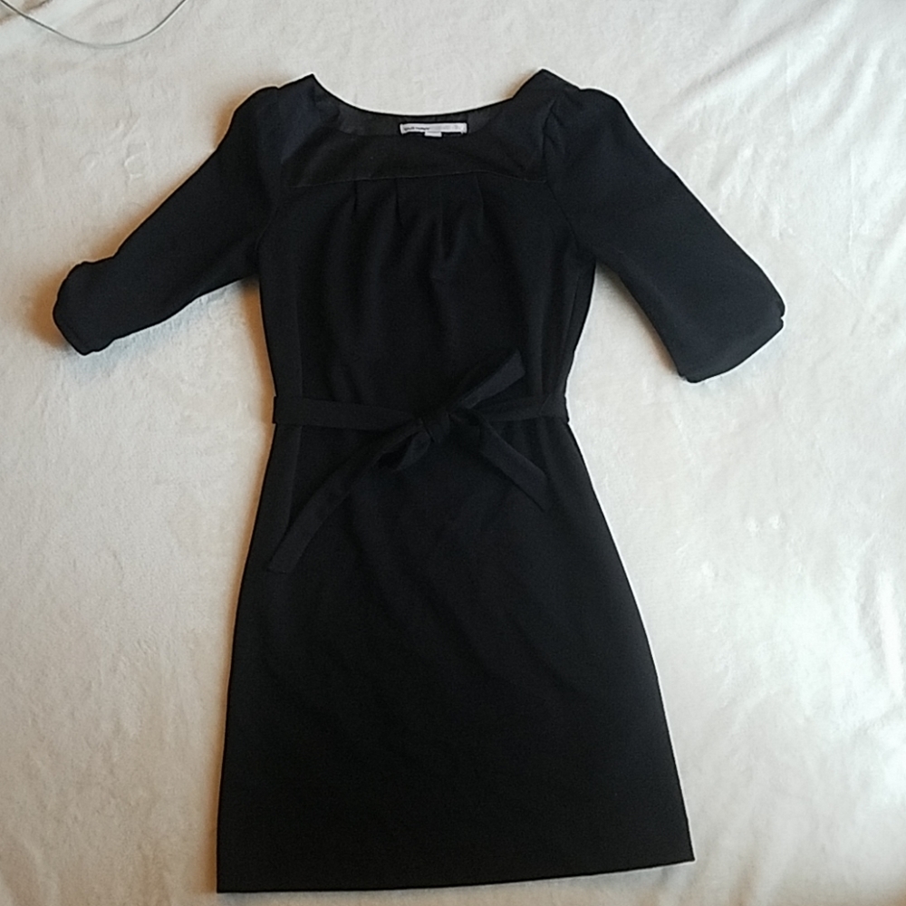 Black, short sleeved belted dress
